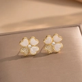 Elegant four-leaf clover stud earrings with white pearl shell and zircon on a jewelry box - Gold White Shell Clover Studs (238)