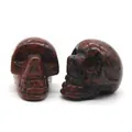 Polished Mahogany Obsidian skull carving with reddish-brown and black spotted texture - Mahogany Obsidian