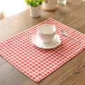 French style red and white checkered linen placemat on a rustic wooden table setting - Red Gingham