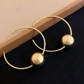 Elegant gold hoop earrings featuring a polished movable metal sphere on a sleek circle - Large Round with Ball Decor / Gold