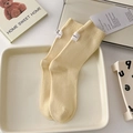 Light yellow ribbed cotton crew socks for women featuring minimalist fabric label accents - One Size / Milky Yellow