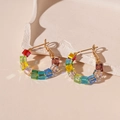 Detailed macro shot of colorful rainbow crystal square beads on golden earring hooks - Silver Earring Post - Colorful