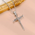 Macro shot of vintage silver cross pendant with Jesus figure and screw nail design - Screw Cross Style (Silver Tone - Tibetan Silver Necklace - 10)