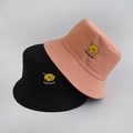 Detail showing lemon embroidery on cotton canvas bucket hats in black and peach colors - Adult 55-58cm / Lemon Pink