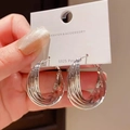 Silver multi-layered hoop earrings with S925 silver needles on a white display card - Silver Multi-Layer Circular Design (E1315 Silver) / 925 Silver Needle / Silver