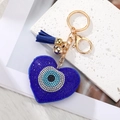 Sparkling blue heart Evil Eye keychain with rhinestone inlay and blue tassel detail - Dark Blue Heart Gold Clasp