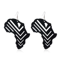 Macro shot of black wooden African map earrings with white geometric arrow patterns - Style 13 (African Print Map)