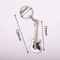 Black and white electric guitar keychain with dimensions of 128mm total length - White