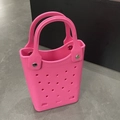 Pink EVA beach tote bag featuring waterproof hole design and secure rivet handles - Rose Red