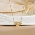 Elegant gold vintage necklace with square crystal pendant on white ceramic tray - Gold Geometric Rectangle Zirconia Style (XL0472)