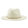 Close-up of woven straw hat with light brown cord and decorative wooden beads - Creamy White