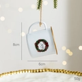 White Christmas mug ornament with green wreath, JOY print and gold trim on festive tree - Wreath Mug Ornament