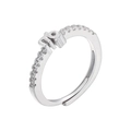 Close-up of Virgo zodiac symbol ring with micro-pave cubic zirconia on adjustable band - Virgo / Silver