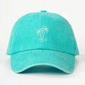 Close-up of white palm tree embroidery on a mint blue cotton twill baseball cap - Lake Blue