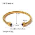 Gold plated twisted rope bangle with round blue lapis stones on a minimalist white background - Gold Twisted-Blue Stone (JDB201418-BE)