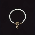 Elegant white oval pearl bracelet with a golden T-bar clasp and rhinestone letter O charm - Gold Letter O (SL2013)