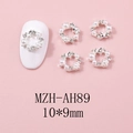 Vue macro de bijoux d'ongles couronne 10x9mm avec perles et strass brillants - Style Grande Couronne Strass Blanc Base Argentée(AH89)