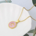 Gold stainless steel necklace with pink shell round pendant featuring the letter C - Pink-C