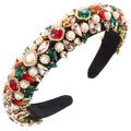 Close-up of Baroque headband with colorful rhinestones and pearls on black velvet - Colorful