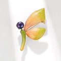 Goldene Libellenbrosche mit orange-grünen Emailleflügeln und einer lila Perle - Orange Grün Farbverlauf Libelle-Schwarze Süßwasserperle