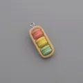 Detailed view of resin three-color macaron charm with a silver metal loop for DIY crafts - Colorful Macaron