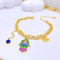 Gold layered Hamsa Hand bracelet with colorful Evil Eye charms and enamel details - Bracelet