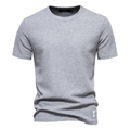 Close-up of premium grey waffle knit fabric and crew neck detail on men's cotton t-shirt - 2XL / Light Gray