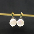 Baroque pearl earrings with emerald gemstones and gold finish on metallic base - Emerald White Stud Earrings 13mm