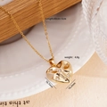Warm gold heart pendant necklace with 18K plating and star-set zircon detailing - Gold Star Heart