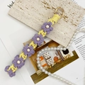 Handmade woven daisy keychain with purple yellow flowers and gold metal ring - Light Yellow + Purple