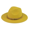 Detail showing bright yellow straw fedora hat featuring a chunky gold metal chain link - Yellow