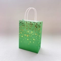 Elegant green paper gift bag with gold star pattern and white rope handles for parties - Green Single-Sided Bronzing Star