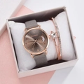 Close-up of rose gold quartz watch with moon dial and matching star crystal bracelet - Watch + Bracelet + Box / Gray