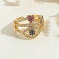 Detail of gold evil eye open ring with red heart zircon and multilayer pavé diamonds - Gold-Pink Zirconia