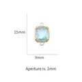 Pierre rectangulaire bleue sertie d'or 14k avec deux anneaux, dimension 15x9mm - Bleu clair