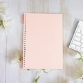 Pink minimalist frosted loose-leaf notebook with rose gold spiral binding on a desk - B5-26 Holes / Morandi Pink -- (2 Pieces Including Clips)