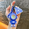 Creative blue astronaut keychain with glowing LED helmet and durable silicone strap - Astronaut Atmosphere Light Pendant / Purple