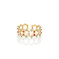 Macro detail of gold-plated honeycomb ring with colorful enamel inlay on white background - Zj131