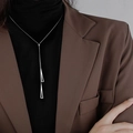 Minimalist silver double triangle pendant necklace for women shown on a model - Geometric Adjustable Necklace