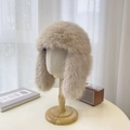 Macro shot of fluffy beige faux fur texture on a warm winter earflap trapper hat - M / Beige