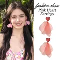 Elegant pink heart stud earrings with layered chiffon flower petals and a silver needle post - Pink Heart