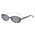 Retro oval sunglasses with black and white spotted cow print frame and white temples - Cow Pattern Frame Grey Lenses