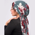 Green floral headscarf hijab with long tails for women shown from a side-back view - Green with Red Floral