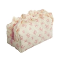Quilted floral makeup bag with pink bow pattern and decorative ruffle trim in off-white - Bow Ruffle Style