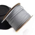 Detailed view of gray 1.5mm braided cotton cord wound on a brown spool for DIY crafts - Approx. 1.5MM / Light Gray