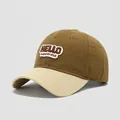 Detailed close-up of kids' cotton baseball cap with HELLO happiness patch embroidery - 54cm (3-8 Years) / Dark Coffee and Beige