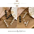 8-piece gold safety pin brooch set with elegant black and white faux pearls - Xianzi Maomei Style (A20-10)
