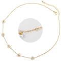 Detail view of 18K gold plated necklace with five elegant pearl flower pendants - Gold
