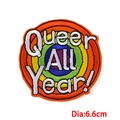Embroidered rainbow patch with 'Queer All Year!' text, 6.6cm circular decorative badge - Queer All Year Rainbow