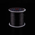 Elastic stretch beading cord in black on a white spool for DIY bracelet making - Black